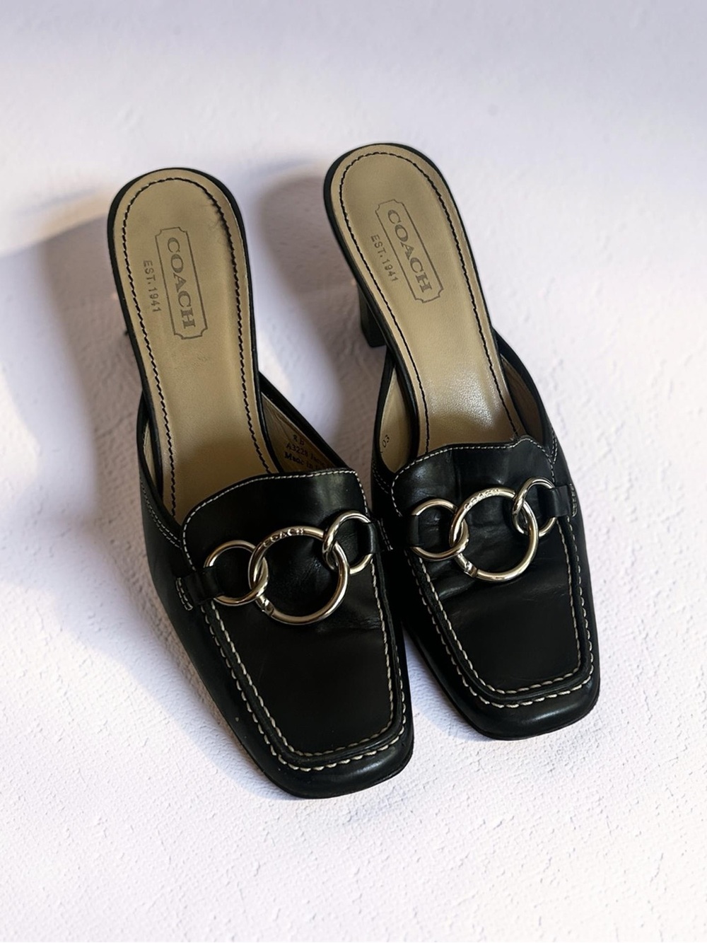 Coach Black Leather Slip-On Mules with Gold-Tone Ring Hardware
